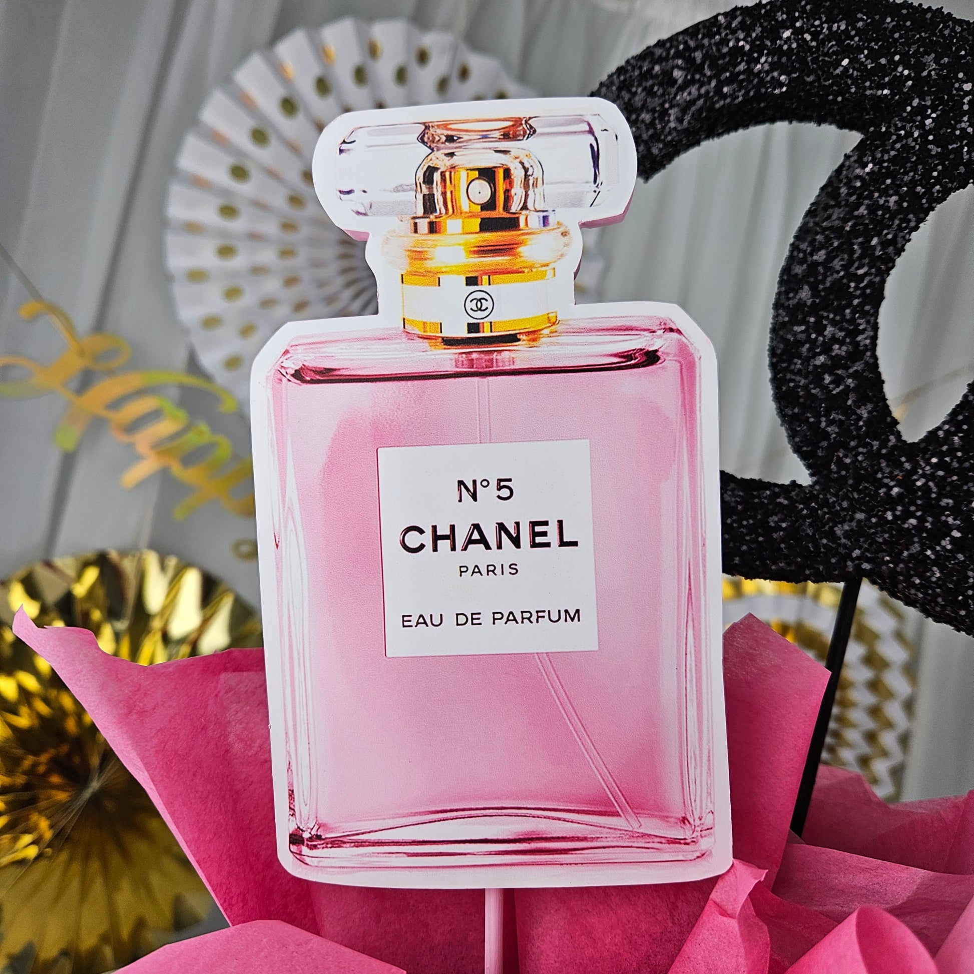 Fashion themed toppers on Chanel inspired gift box centerpiece for glam party decor