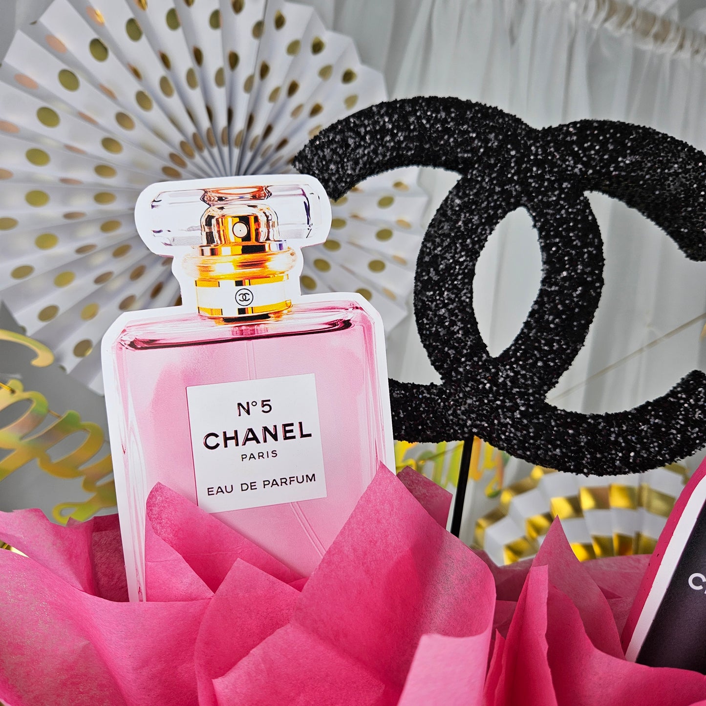 Chanel inspired gift box centerpiece for spa party and glam birthday decor