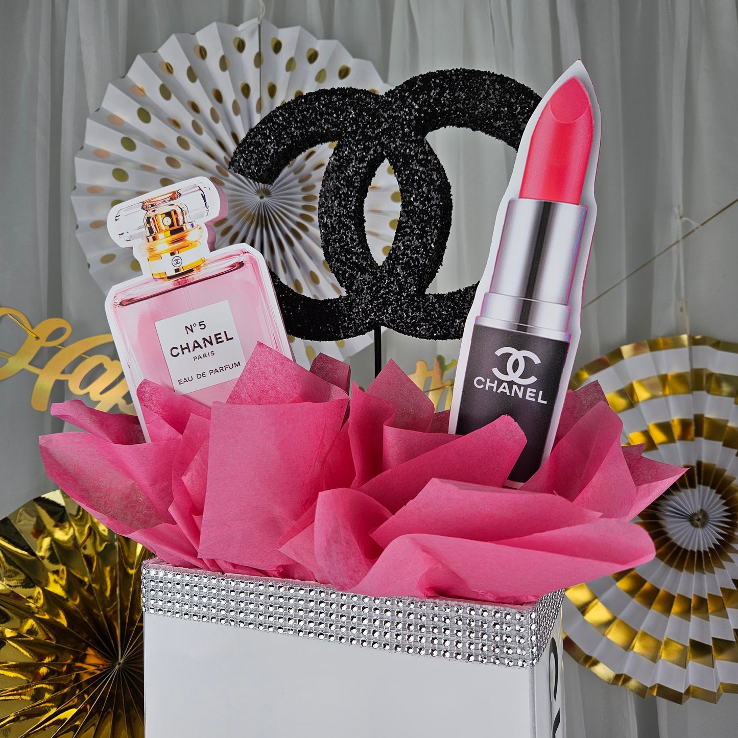 Statement Chanel inspired gift box centerpiece for luxury Paris themed celebrations