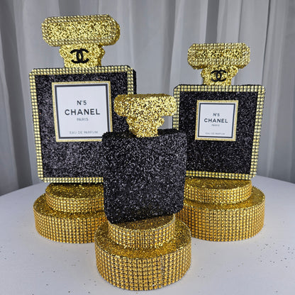 black and gold chanel birthday decorations Glam Chanel party perfume centerpiece with black glitter and gold accents