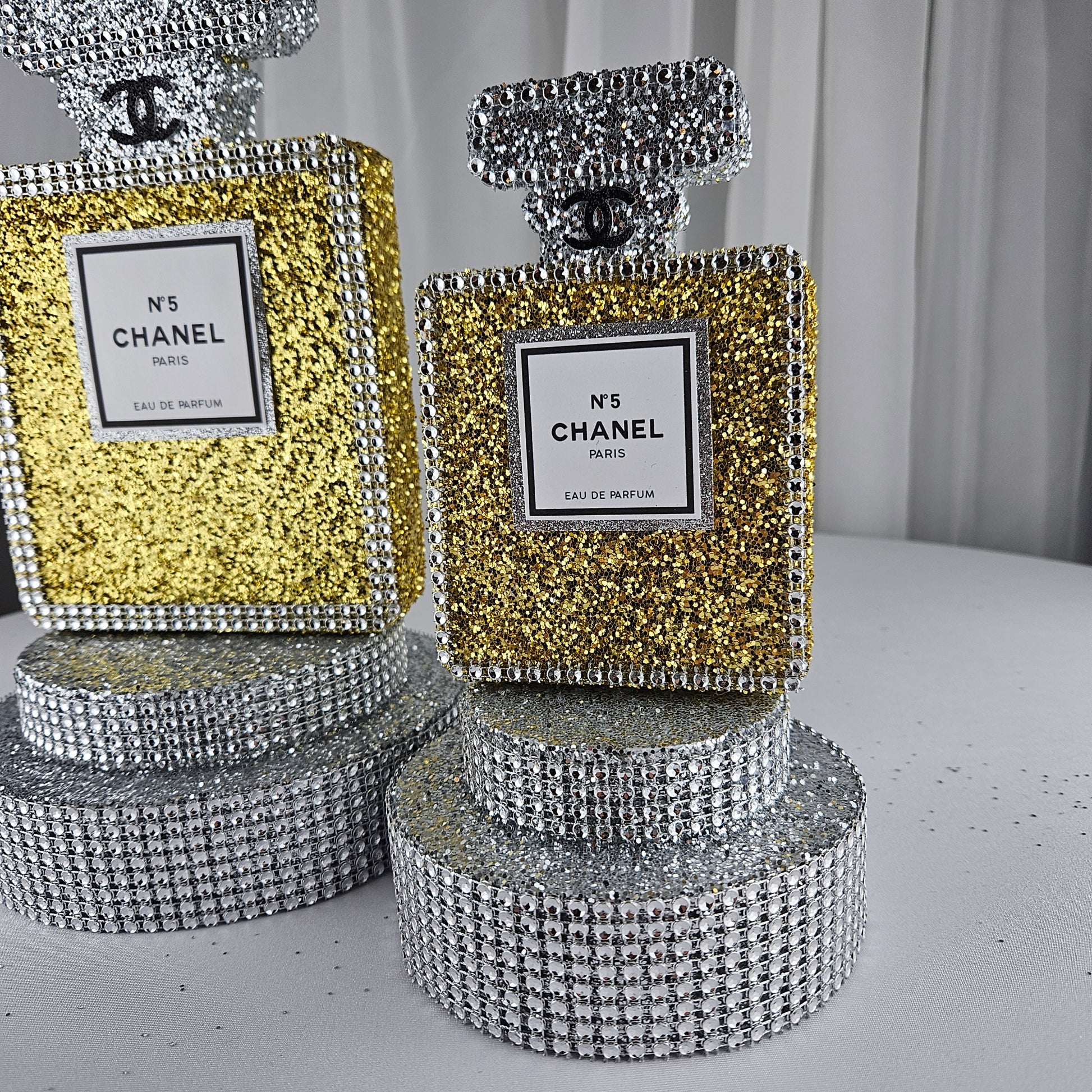 gold chanel birthday decorations Handmade foam Chanel inspired perfume bottle centerpiece gold silver for fashion themed birthday party decor