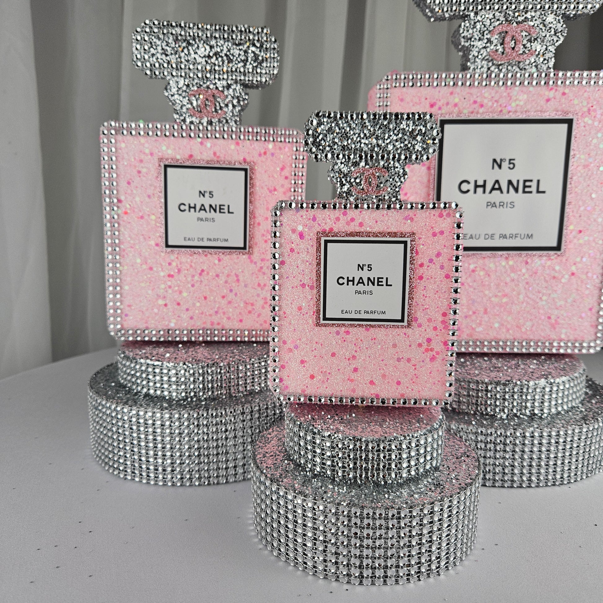 pink chanel birthday decorations Lifestyle styled Chanel inspired perfume centerpiece for glam spa birthday party