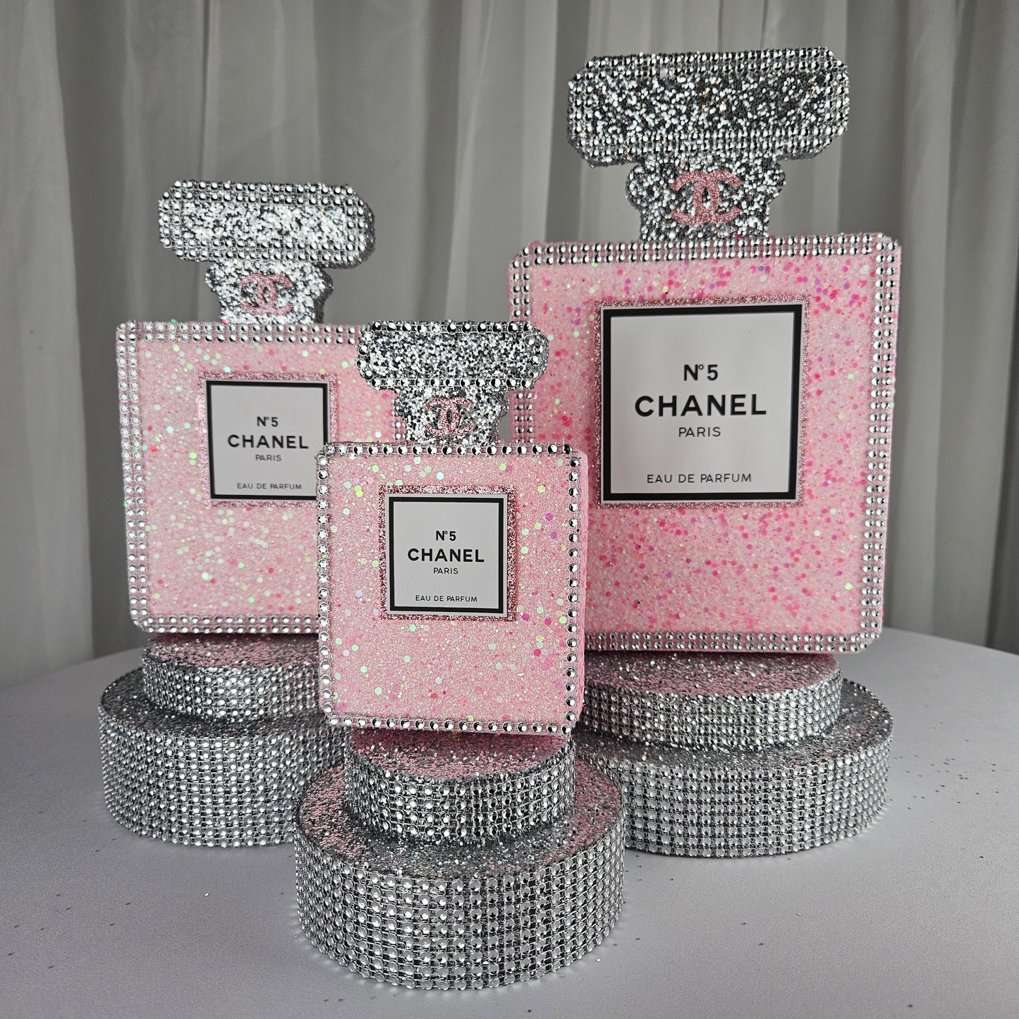 pink chanel birthday decorations Set of pink and silver Chanel inspired perfume centerpieces for Paris themed birthday decor