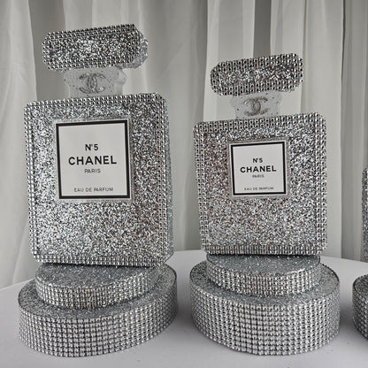 Close up of Chanel inspired label on silver glam birthday centerpiece