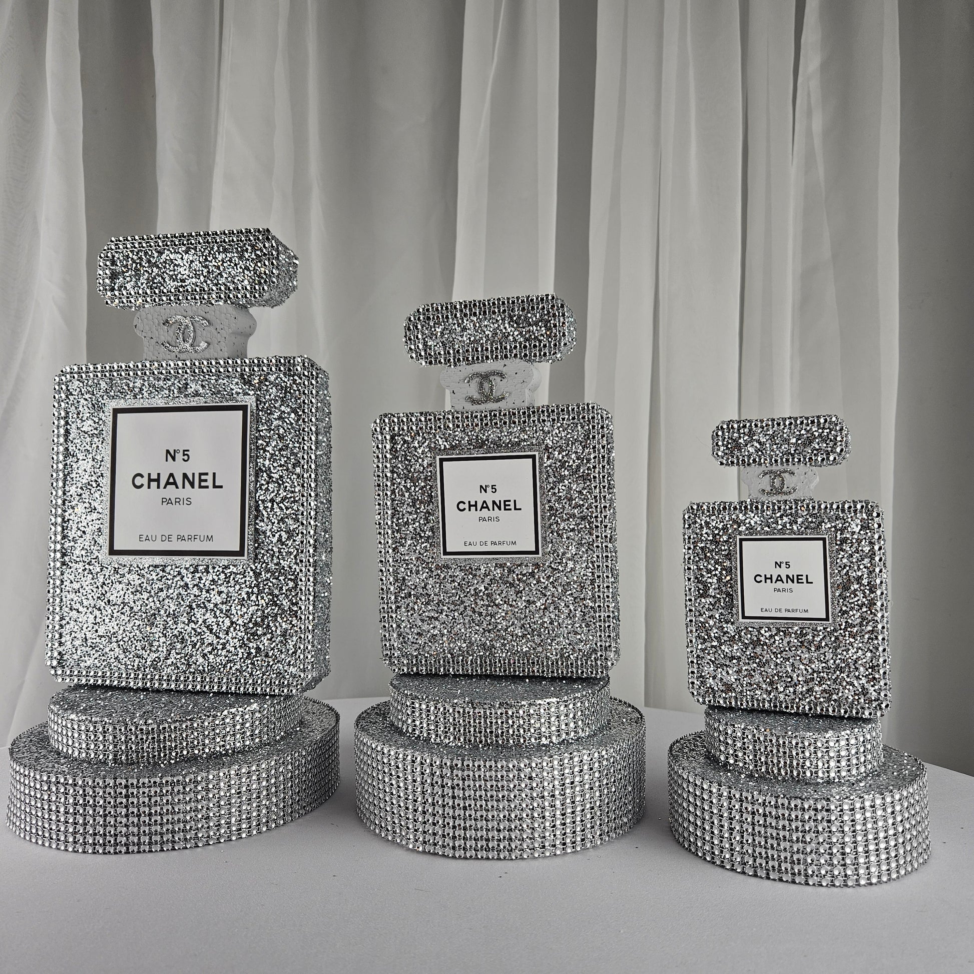 Handmade foam Chanel inspired silver perfume centerpiece for glam parties