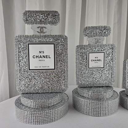 Rhinestone trim detail on silver Chanel inspired perfume centerpiece