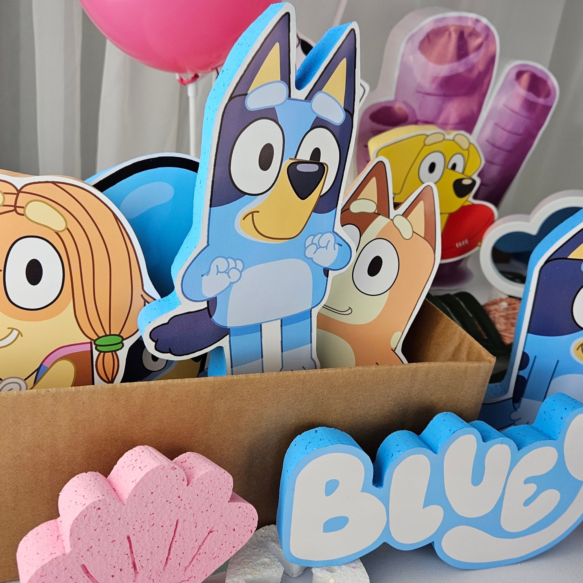 Pink Bluey birthday decorations perfect for girls’ party cutouts and centerpieces.